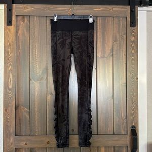Lululemon leggings size 4 black with floral, tropical print